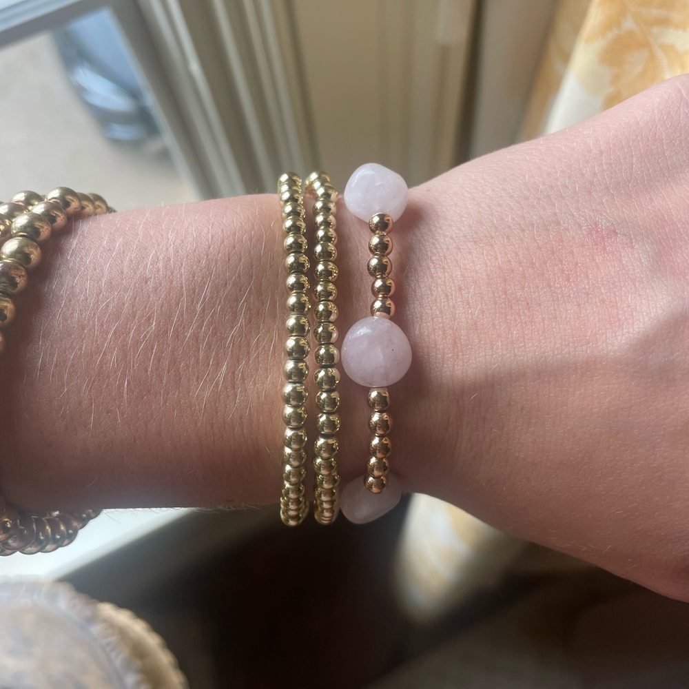 gold and pink beaded bracelet